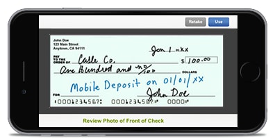 Can a personal check be deposited at an ATM using a prepaid card?