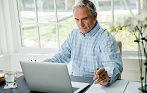 investor-at-desk-147x91.jpg