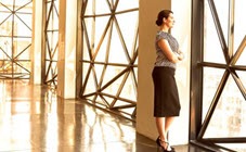 Woman looking out window