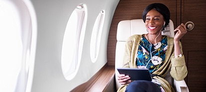 Business woman in private jet