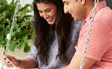 Couple looking at tablet